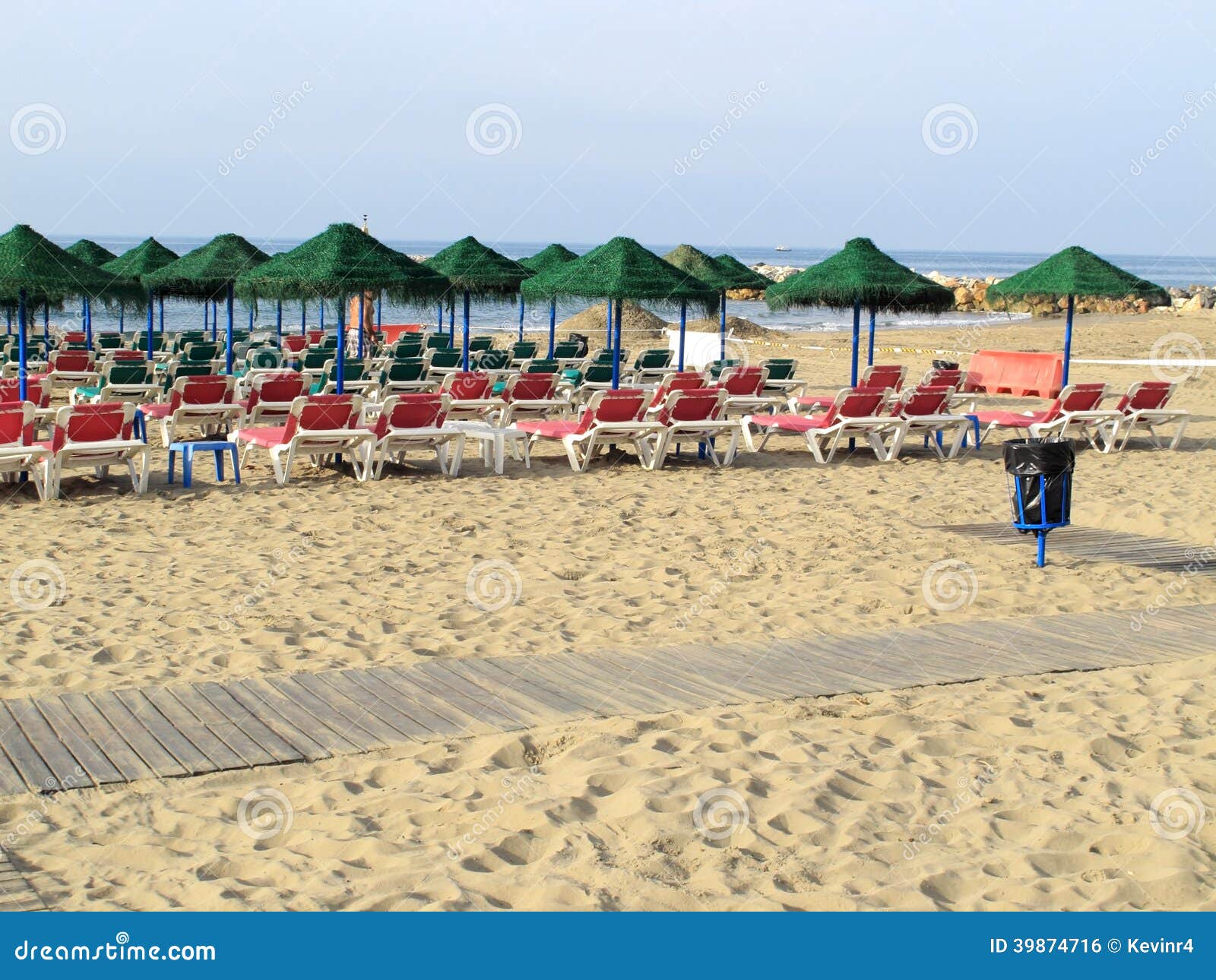 Rows of Umbrellas in Spain stock photo. Image of horizon 39874716
