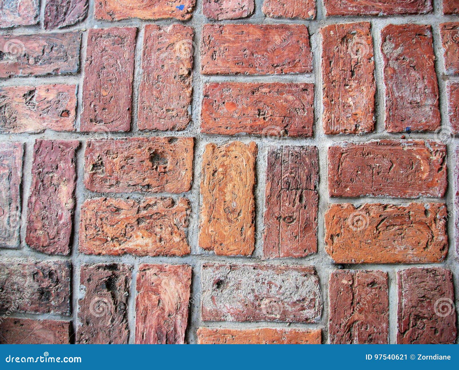 rows of worn bricks in distinct pattern
