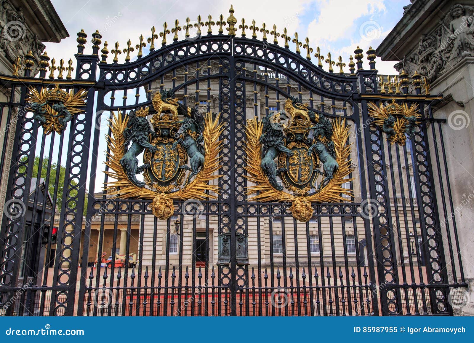 Royal Coat of Arms of England. LONDON, GREAT BRITAIN - MAY 9, 2014: This is the royal arms of England on the gate railings of Buckingham Palace.