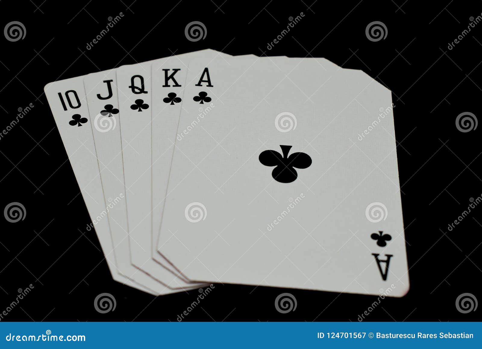 Royal Flush of Clubs in Poker Authentic Casino Cards Game on a Black ...