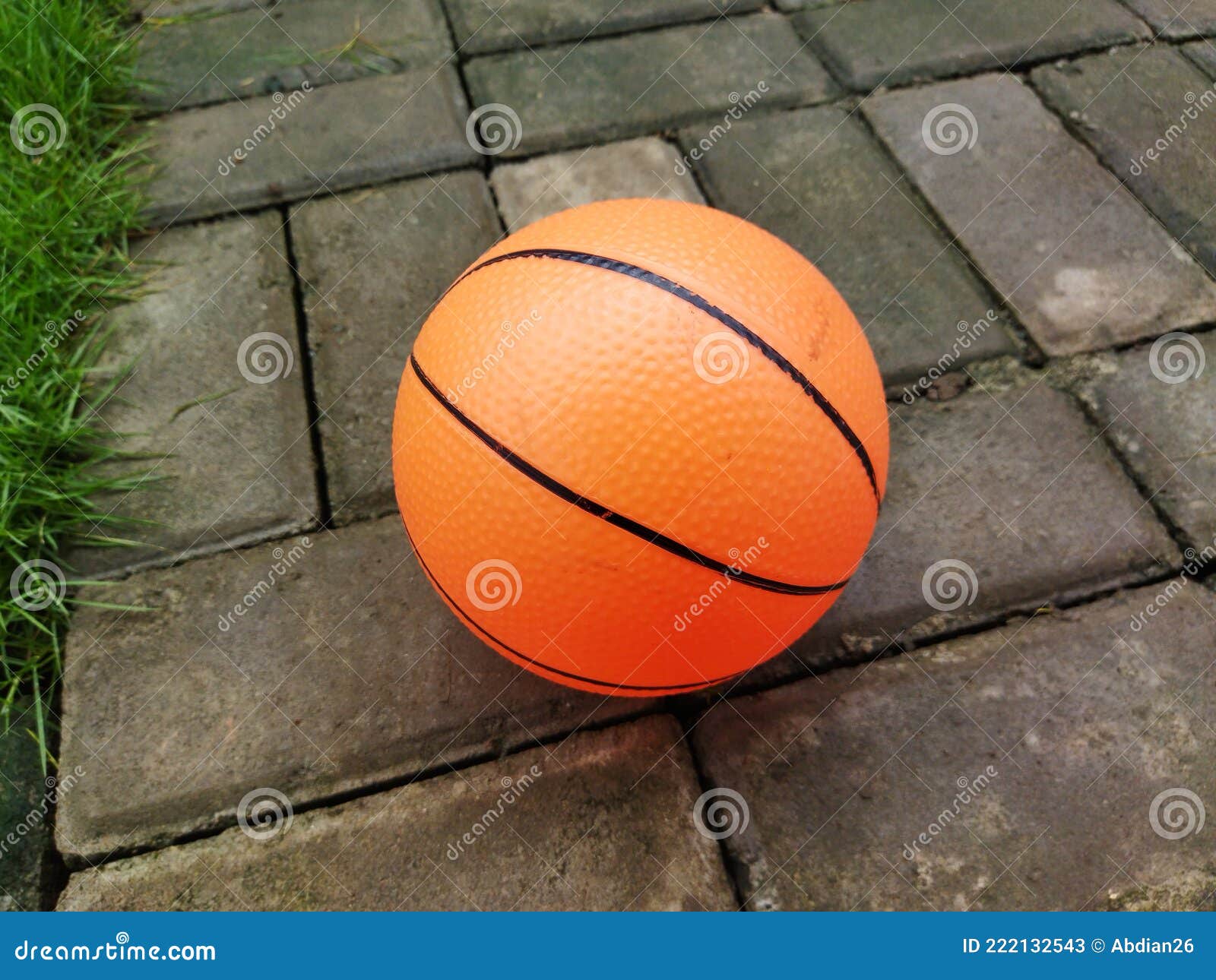 Rubber basketball toy stock image. Image of yellow, game 222132543