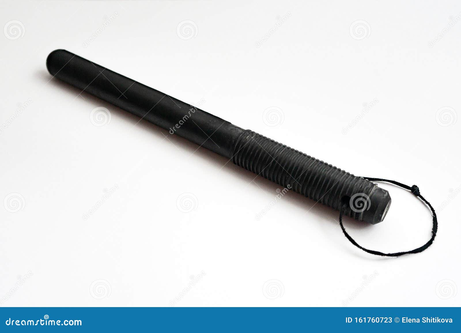 Rubber Baton of a Russian Policeman on a Light Background. Stock Image