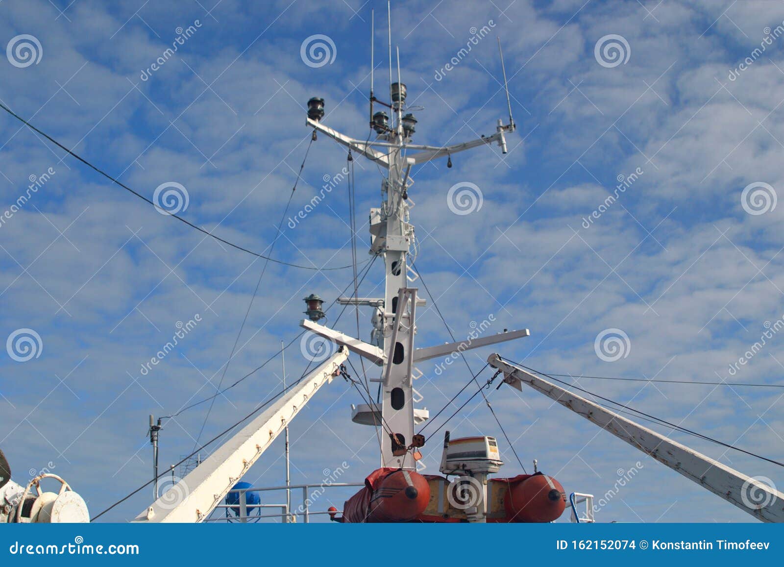 Rubber Boat with Motor and Mast with Navigation Equipment on the Deck
