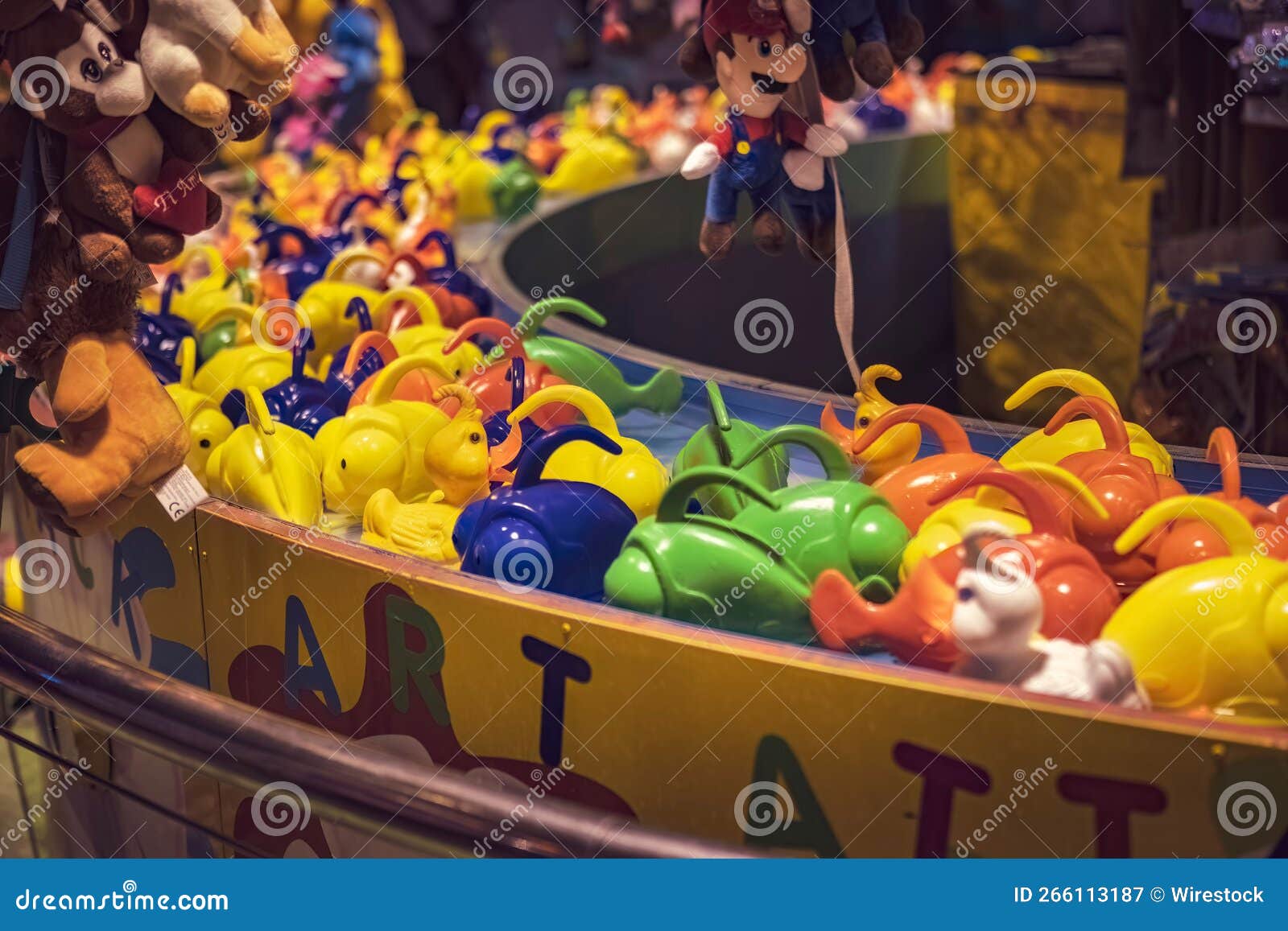 Rubber duck fishing game editorial photography. Image of fair