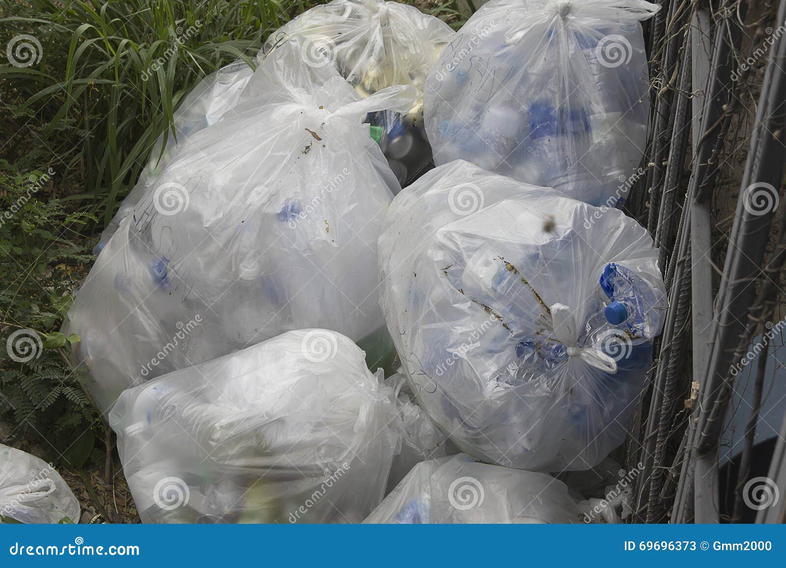 Rubbish Bag Trash Plastic beside Fence Stock Image Image of trash