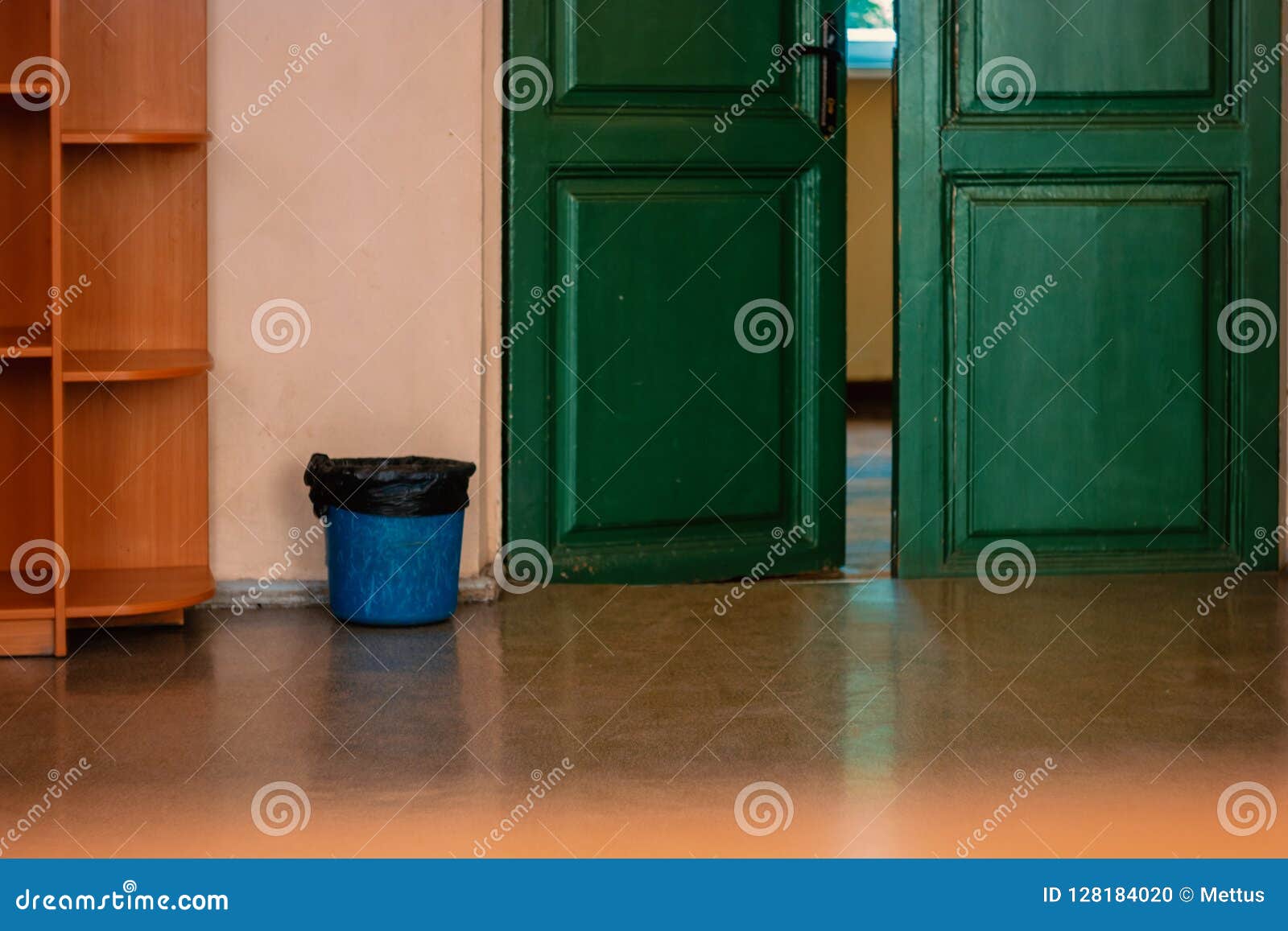 Rubbish Bin Hanging on Class Floor. Plastic Rubbish Bin Near Door