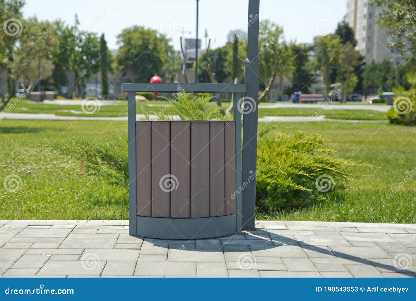 Rubbish Box in the Park . a Wooden Urn and a Comfortable Empty Park
