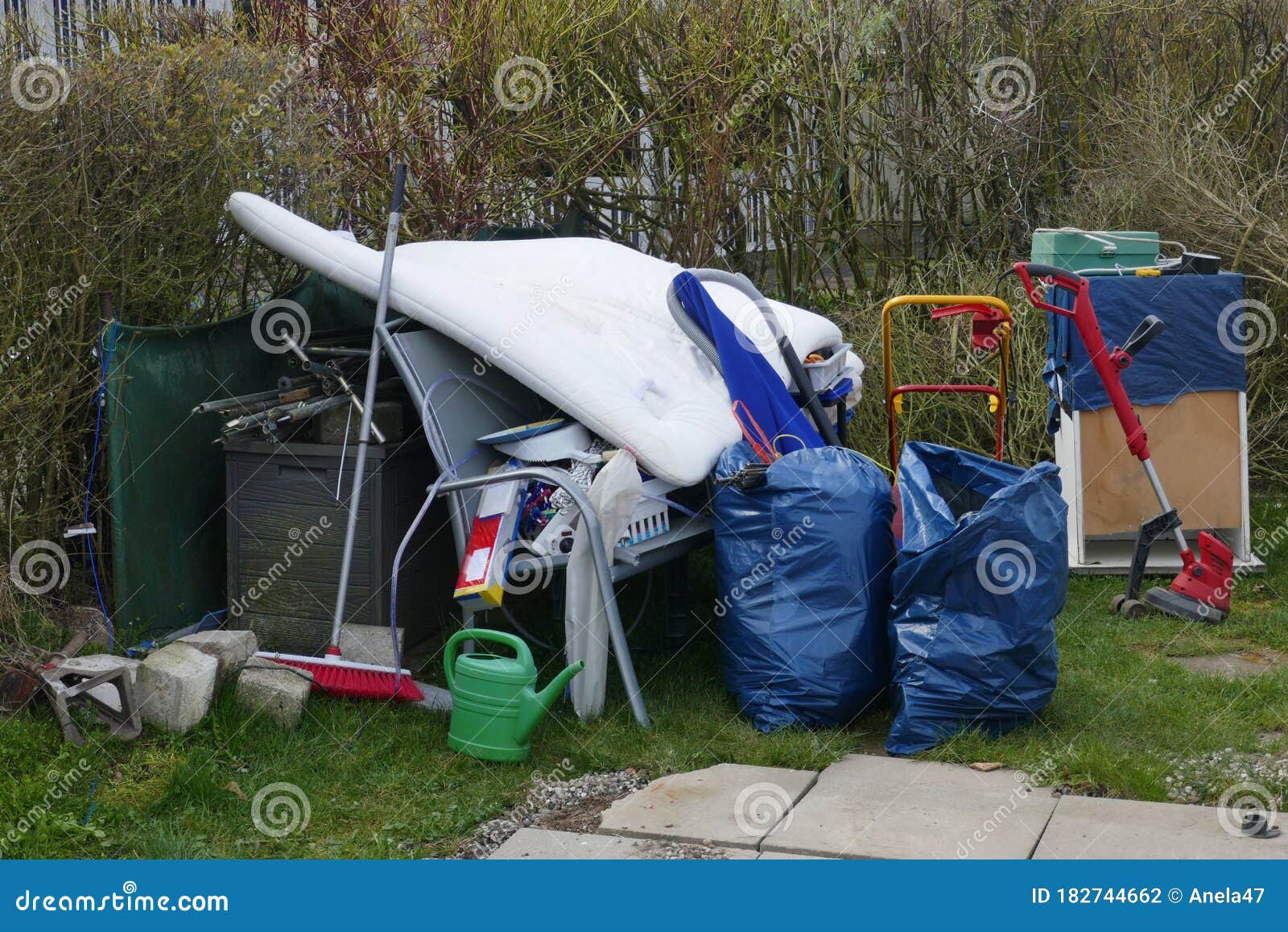 rubbish, rubble and scrap left behind at a campsite. ready for removal by the garbage disposal.