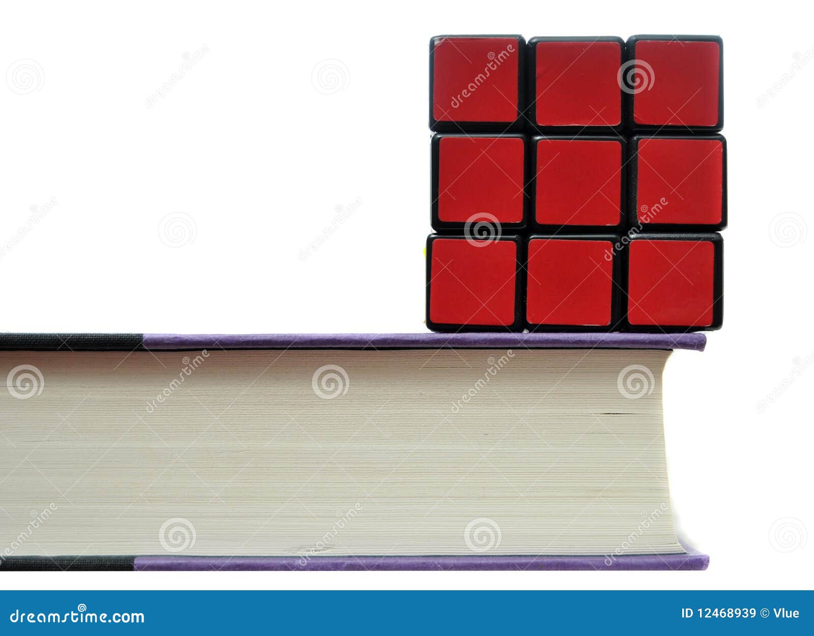 Rubiks Cube on Book editorial stock image. Image of finished 12468939