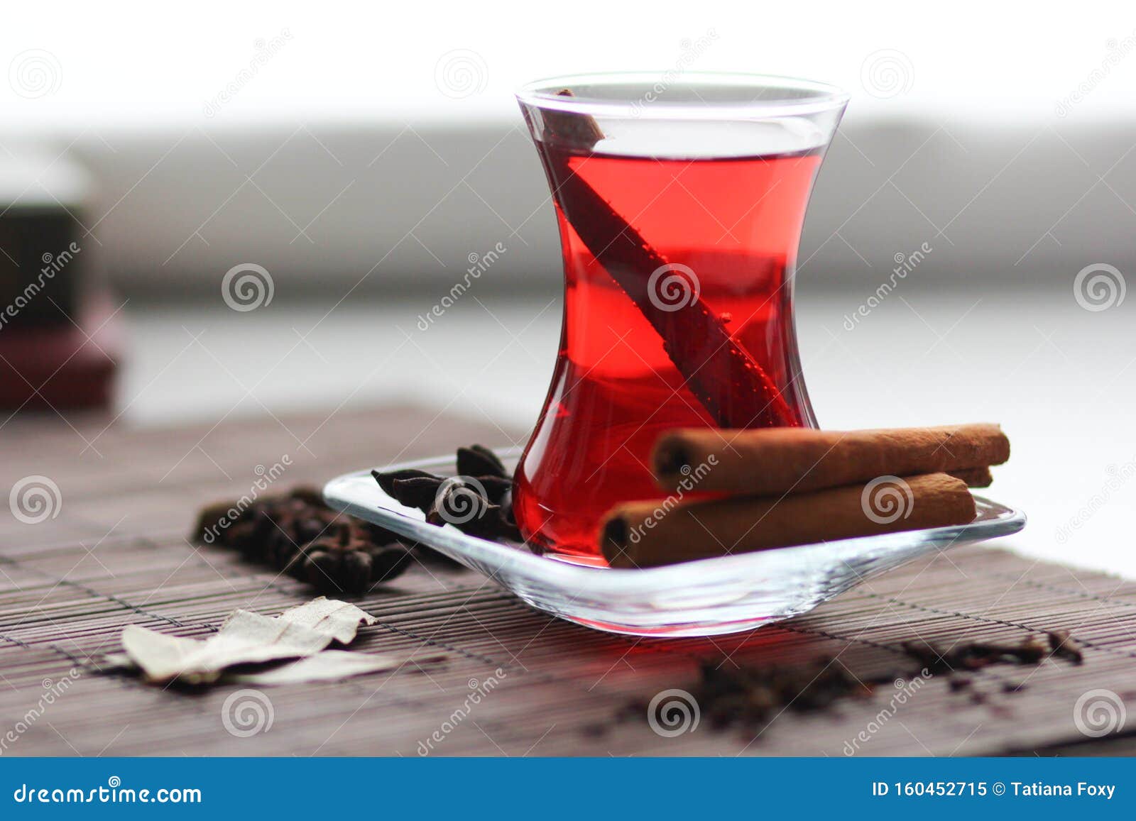 ruby carcade tea with cinnamon sticks, cloves, badyan and bay leaves