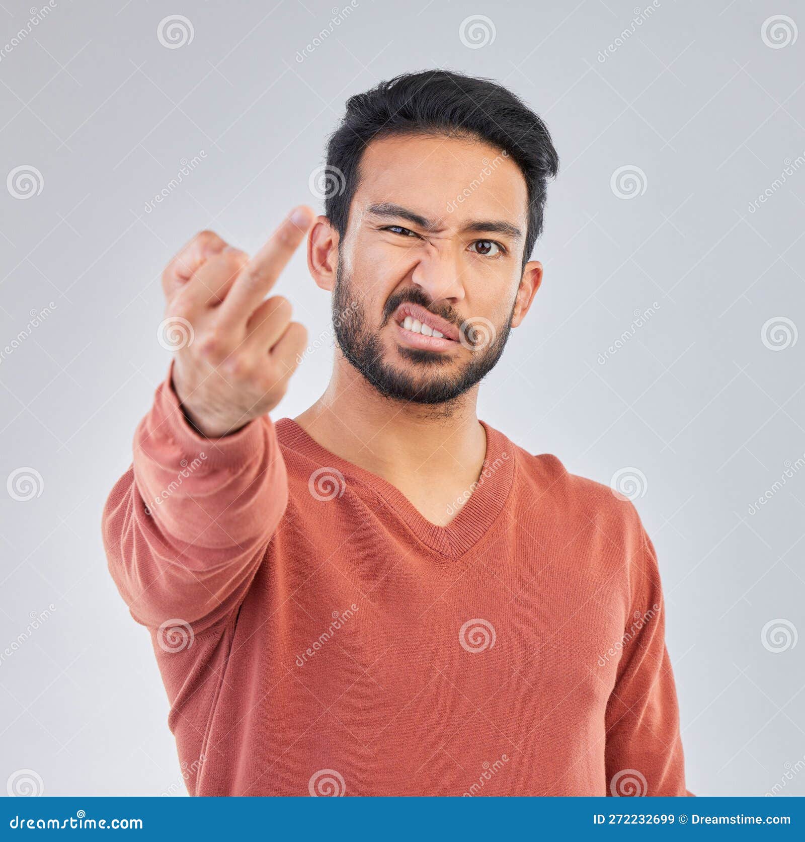 Rude Middle Finger and Portrait of Asian Man in Studio for Fail Rude Middle Finger and Portrait of Asian Man in Studio for Fail