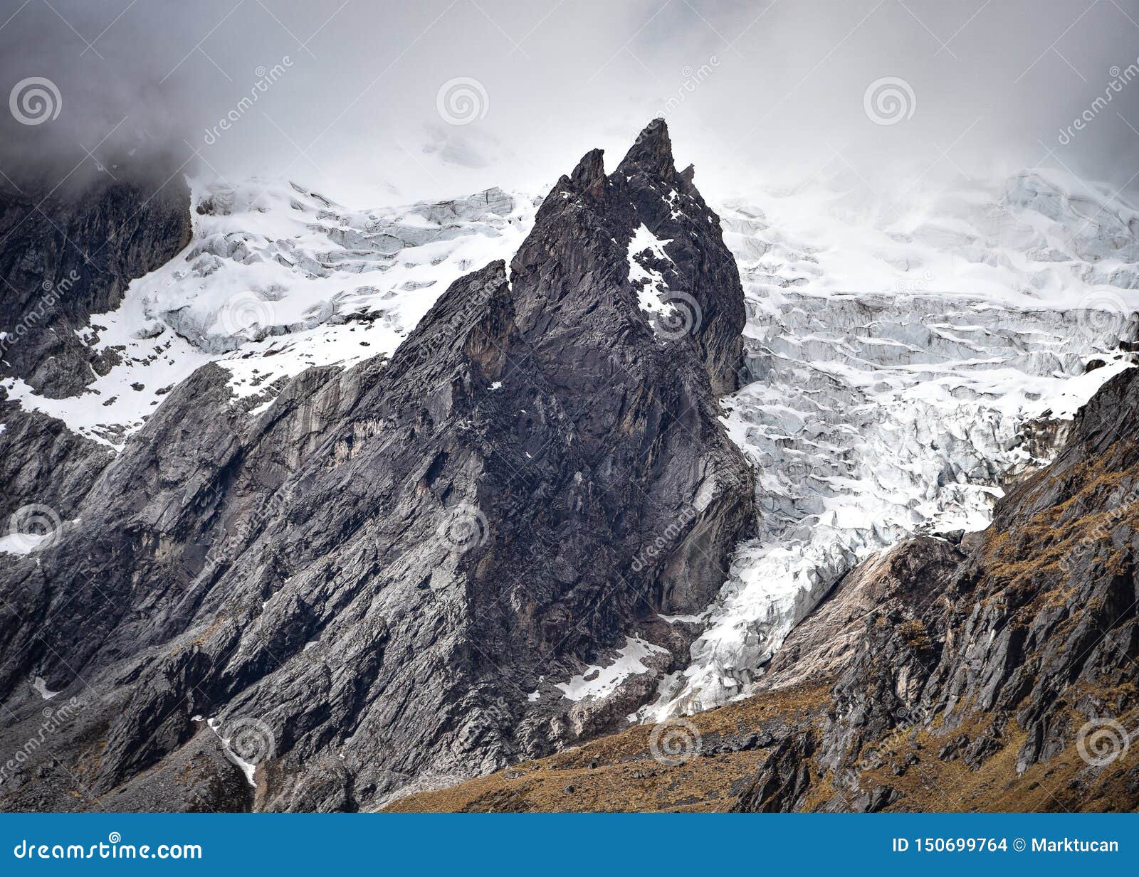 rugged mountain peaks and glaciars in the quesqa valley, cusco, peru