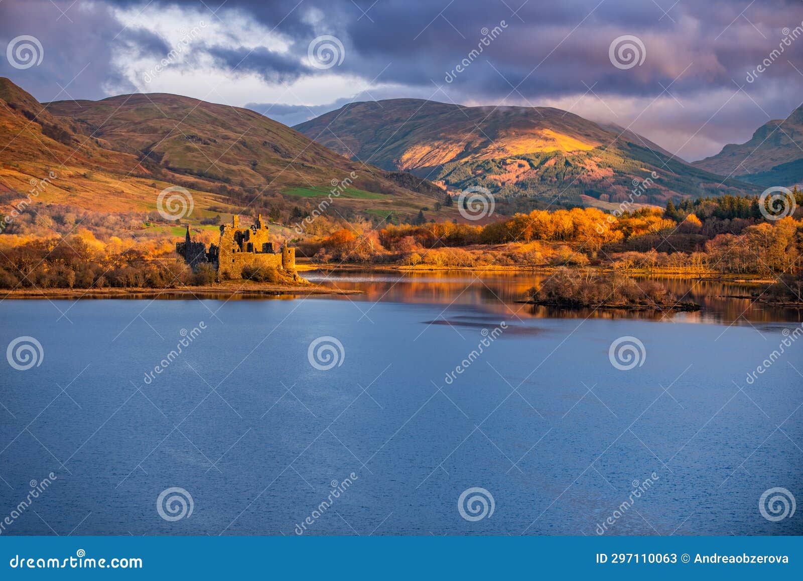 the ruin of kilchurn castle, highland mountains and loch awe, scotland.