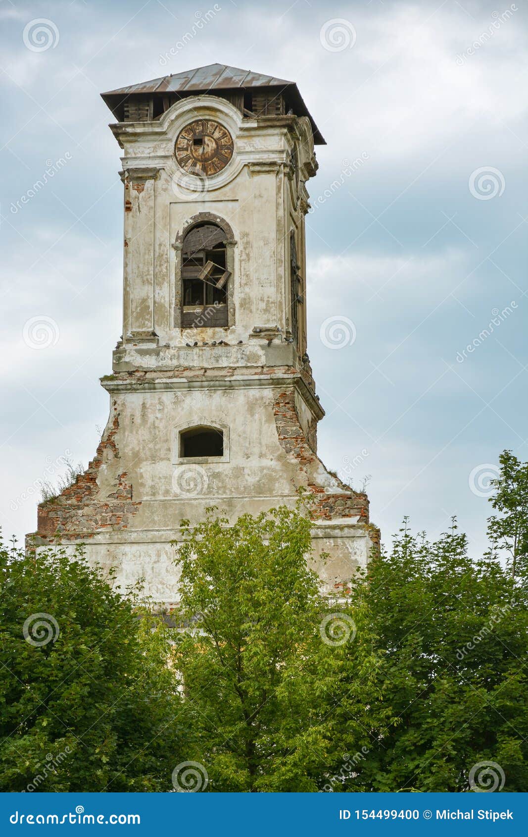 ruins of old tower with clock in preso
