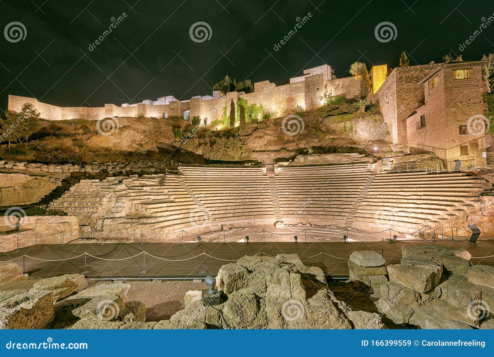 ruins of the teatro romano, on the west slope of the alcazaba hill