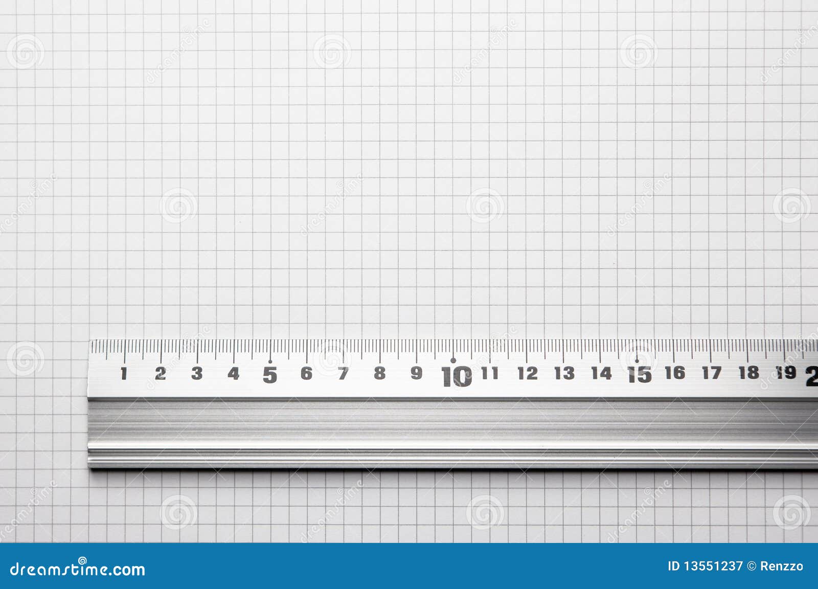 ruler aligned to a scaled paper