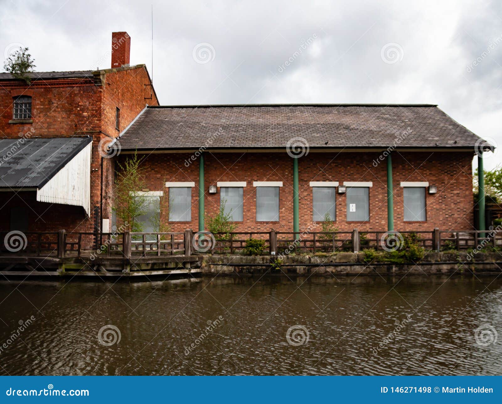 Canal side warehouse stock photo. Image of architecture 146271498