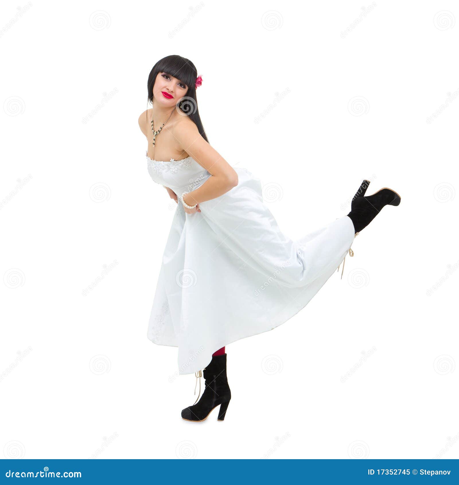 Runaway bride posing against isolated white background