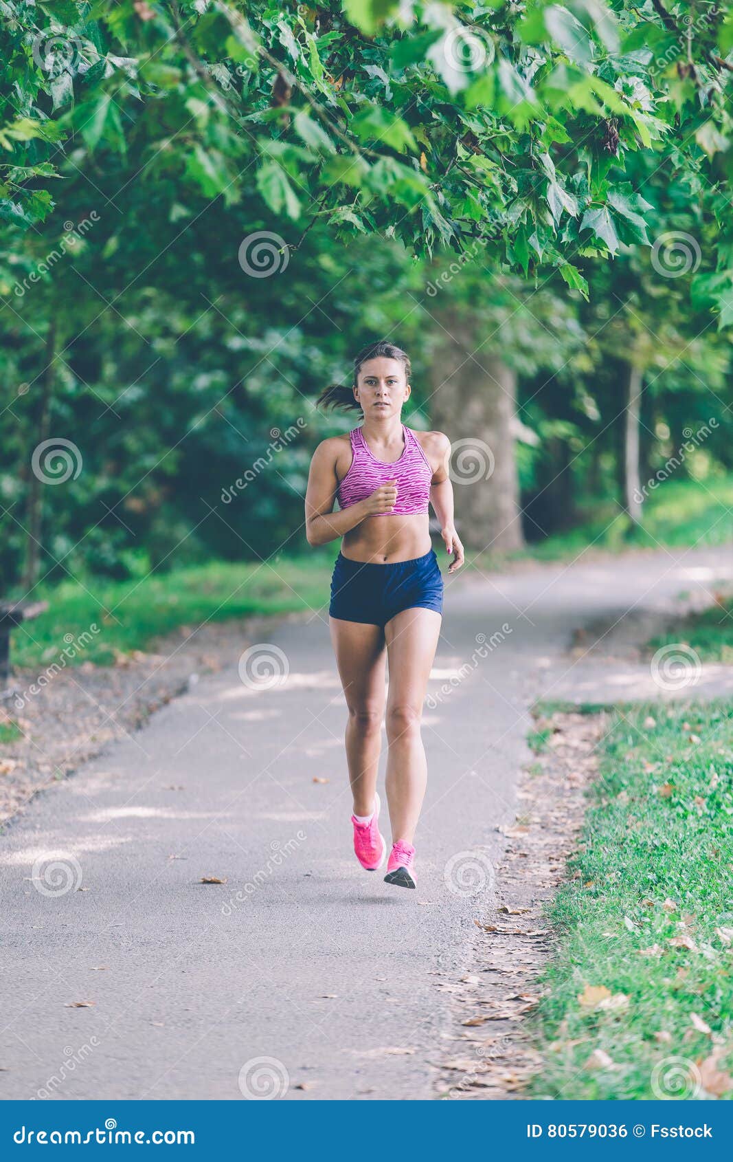 Runner Athlete Running at Park. Woman Fitness Jogging Workout Wellness ...