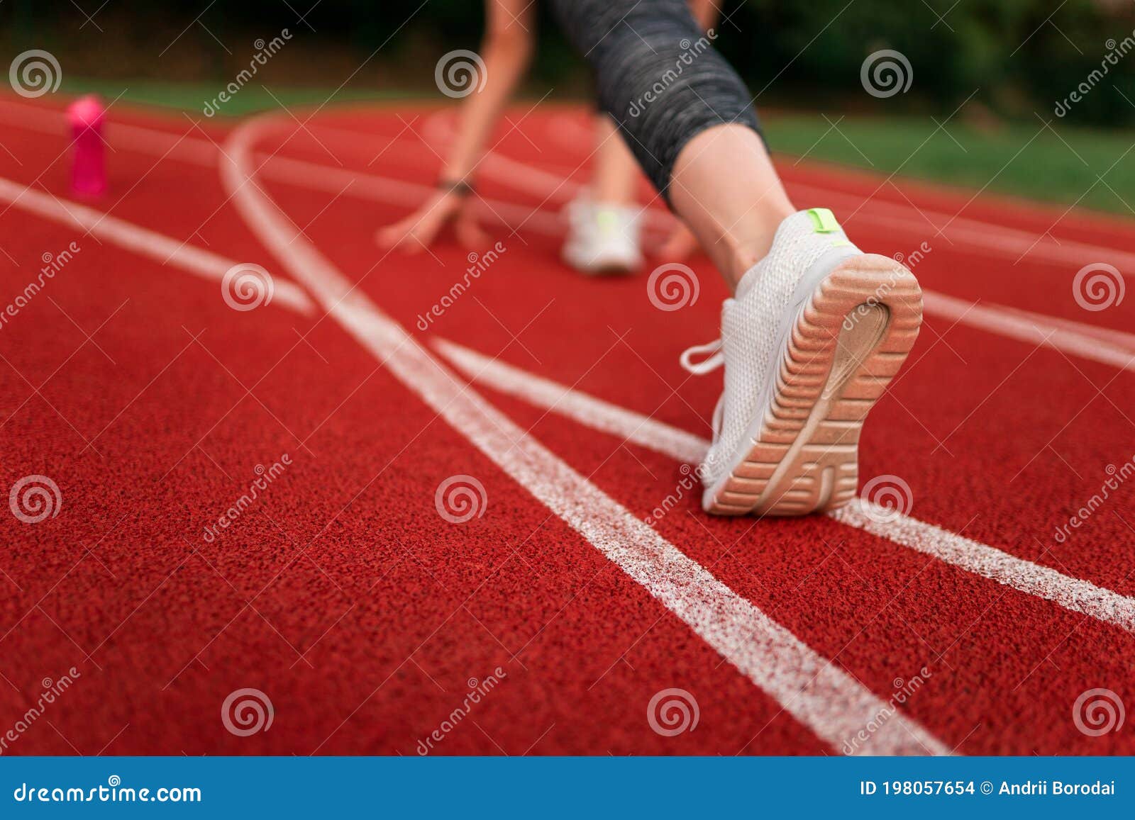 Runner Feet in the Stadium Track. Stock Photo Image of shoe, ready