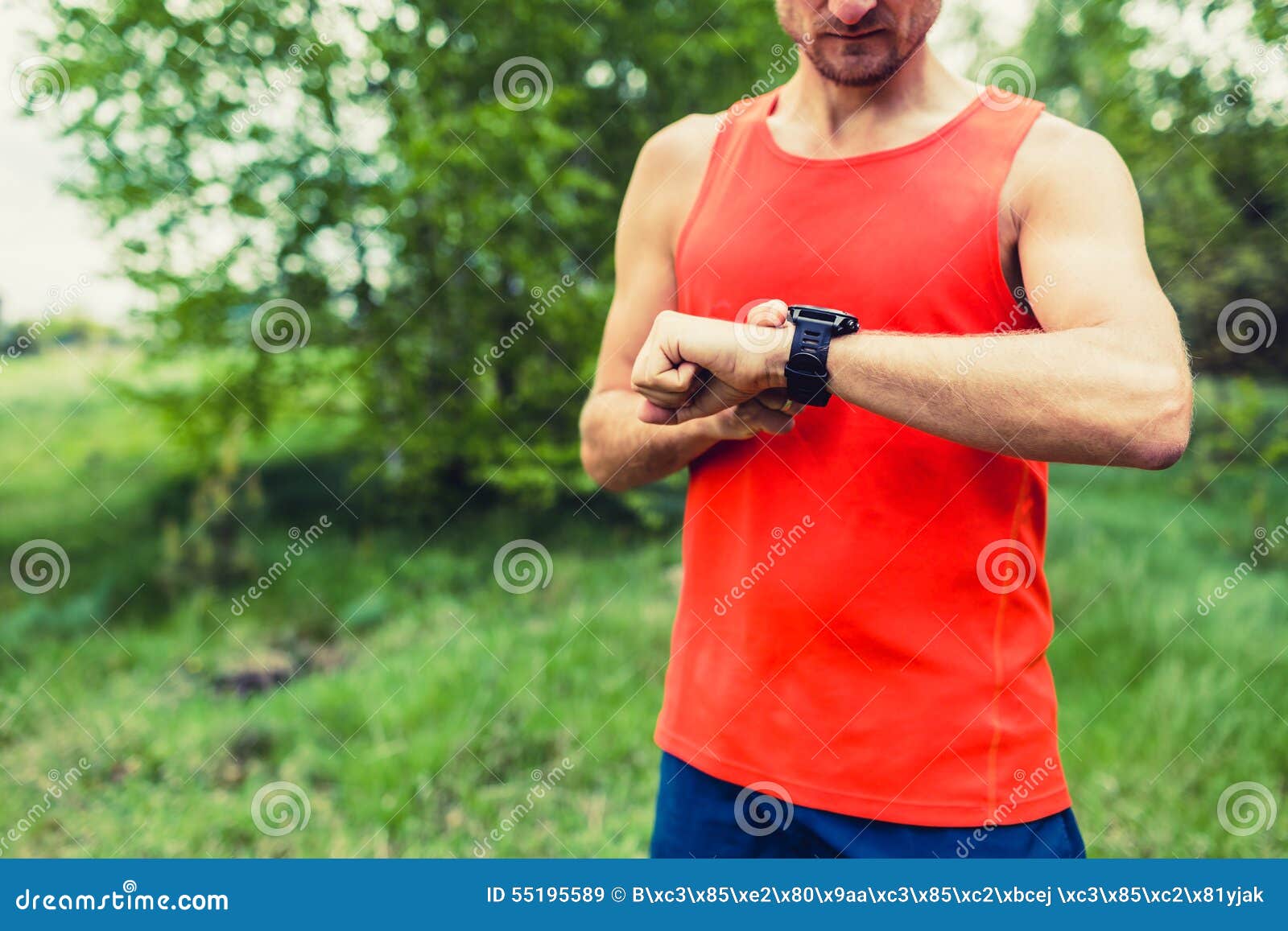 runner looking at sport smart gps watch