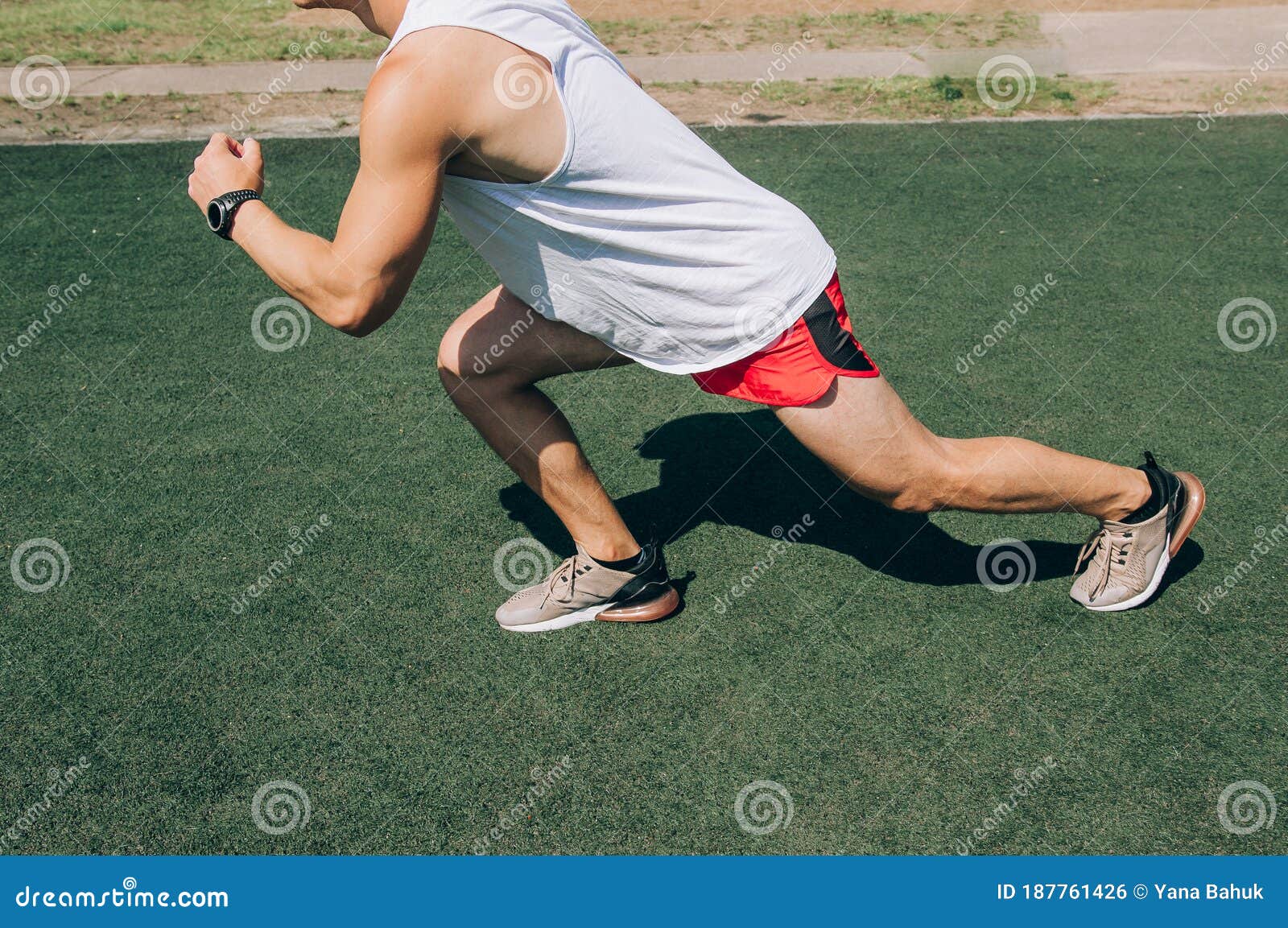 Runner Man Getting Ready To Run Doing Warm Up Dynamic Leg Stretch Exercises Routine Stock Photo Image Of Outside Jogging