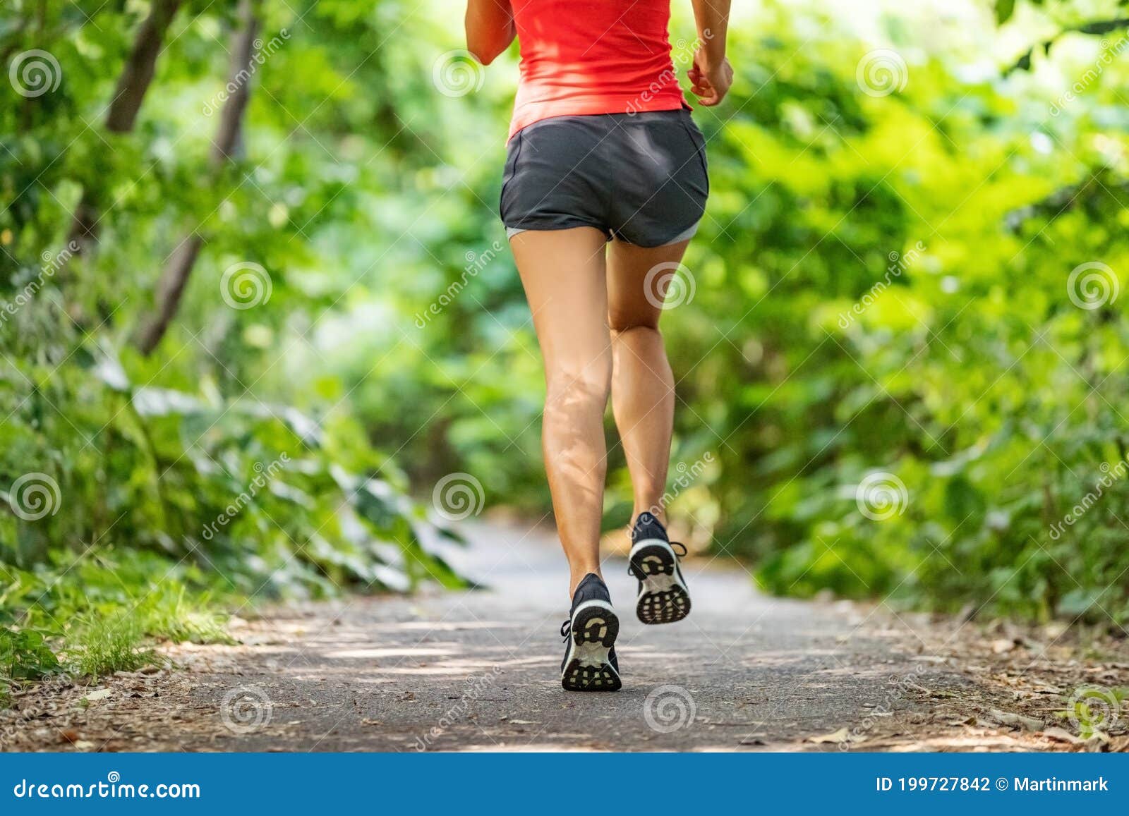 Runner Running Legs from the Back Jogging on Nature Path Outside ...