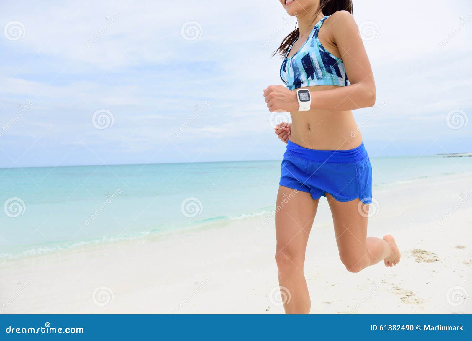 Woman in sport bra and shorts at beach photo – Free Grey Image on