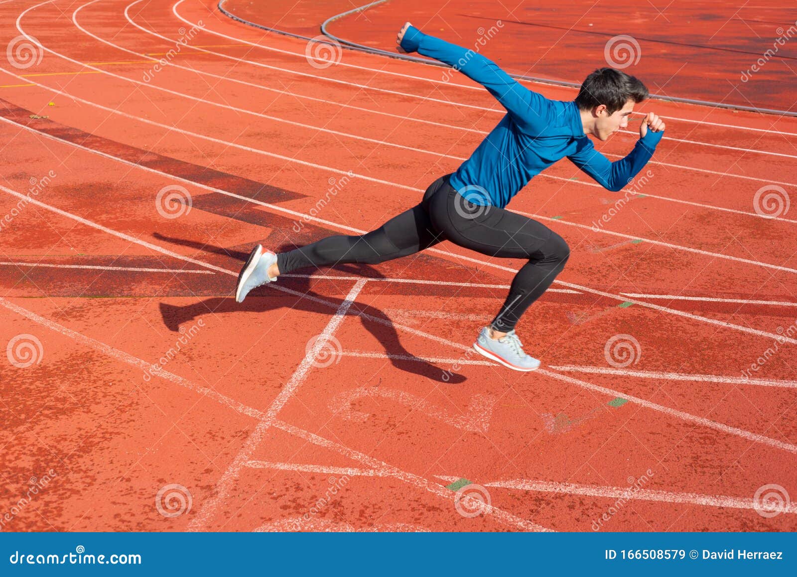 Runner Starting His Sprint on Running Track in a Stadium. Stock Image ...