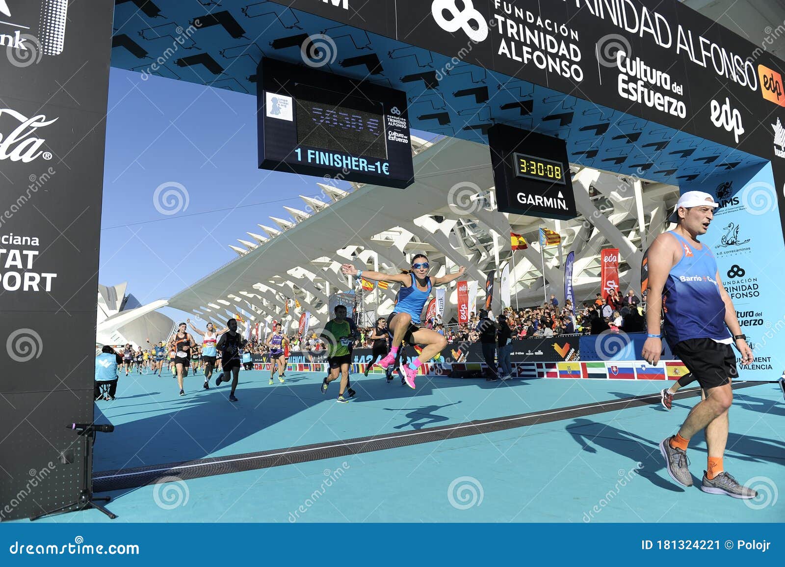 Runners Entering Finish Line in the Valencia Marathon Editorial - of health, cheerful: 181324221