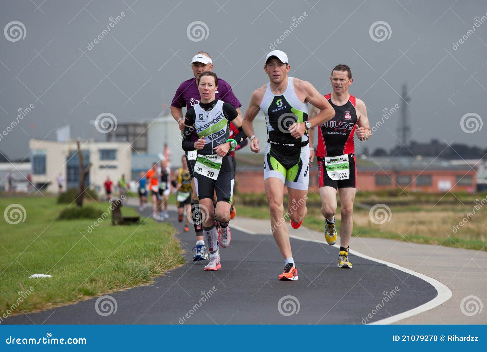 Runners, triathlon editorial image. Image of speed, street 21079270