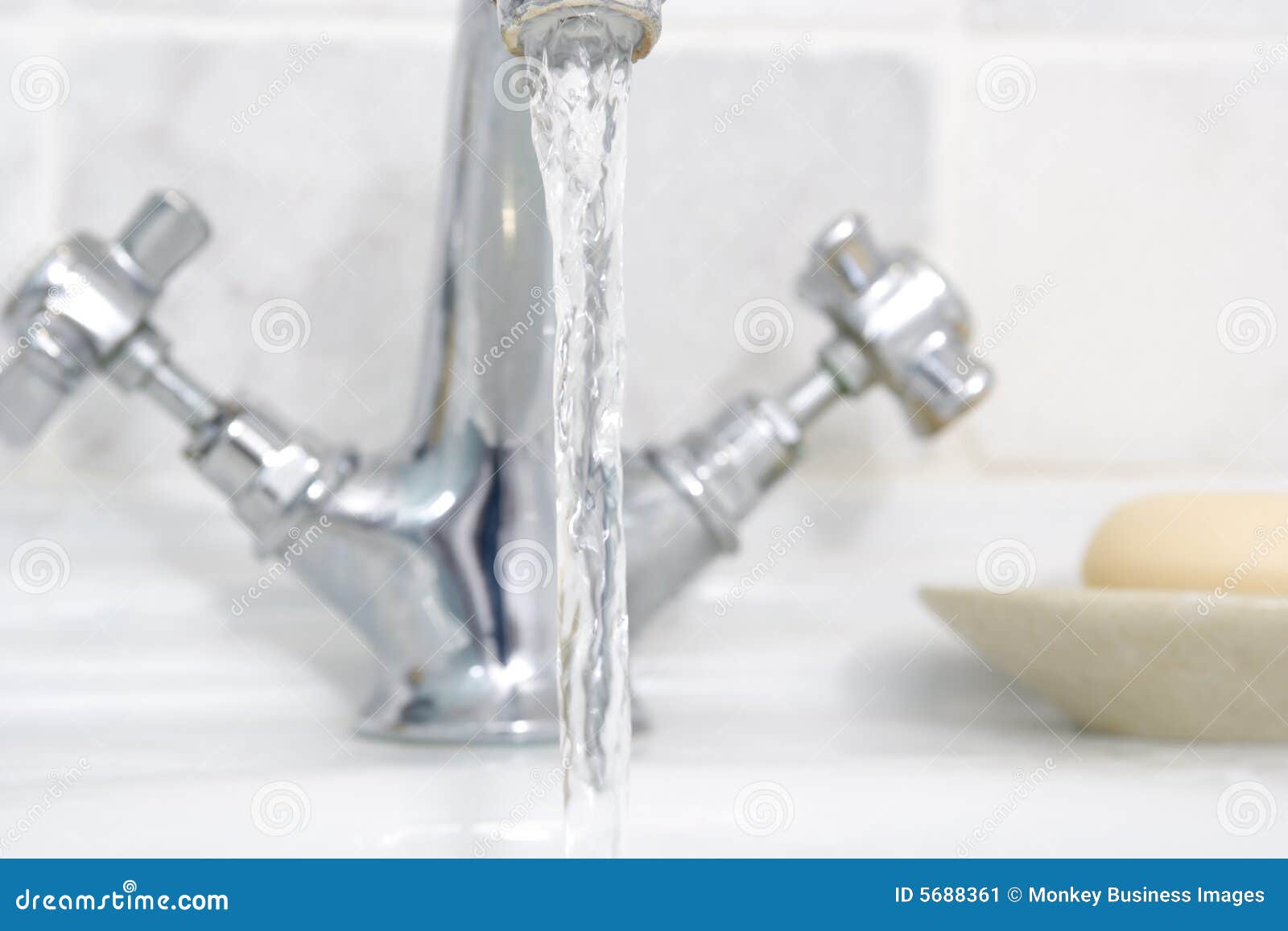 Running bathroom sink stock image. Image of home, fawcet 5688361