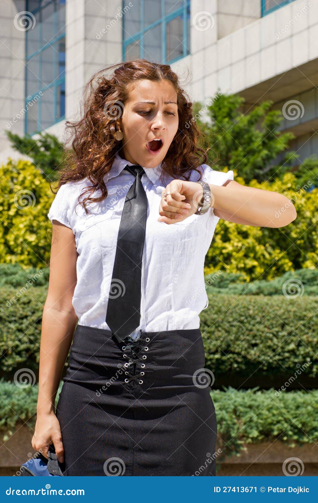 Young bussines woman running late