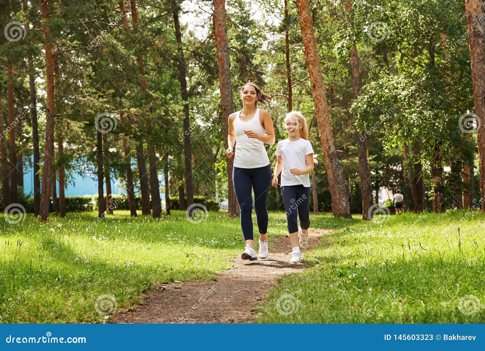 Running Mother and Daughter. Woman and Child Jogging in a Park. Outdoor  Sports and Fitness Family Stock Image - Image of running, people: 145603323