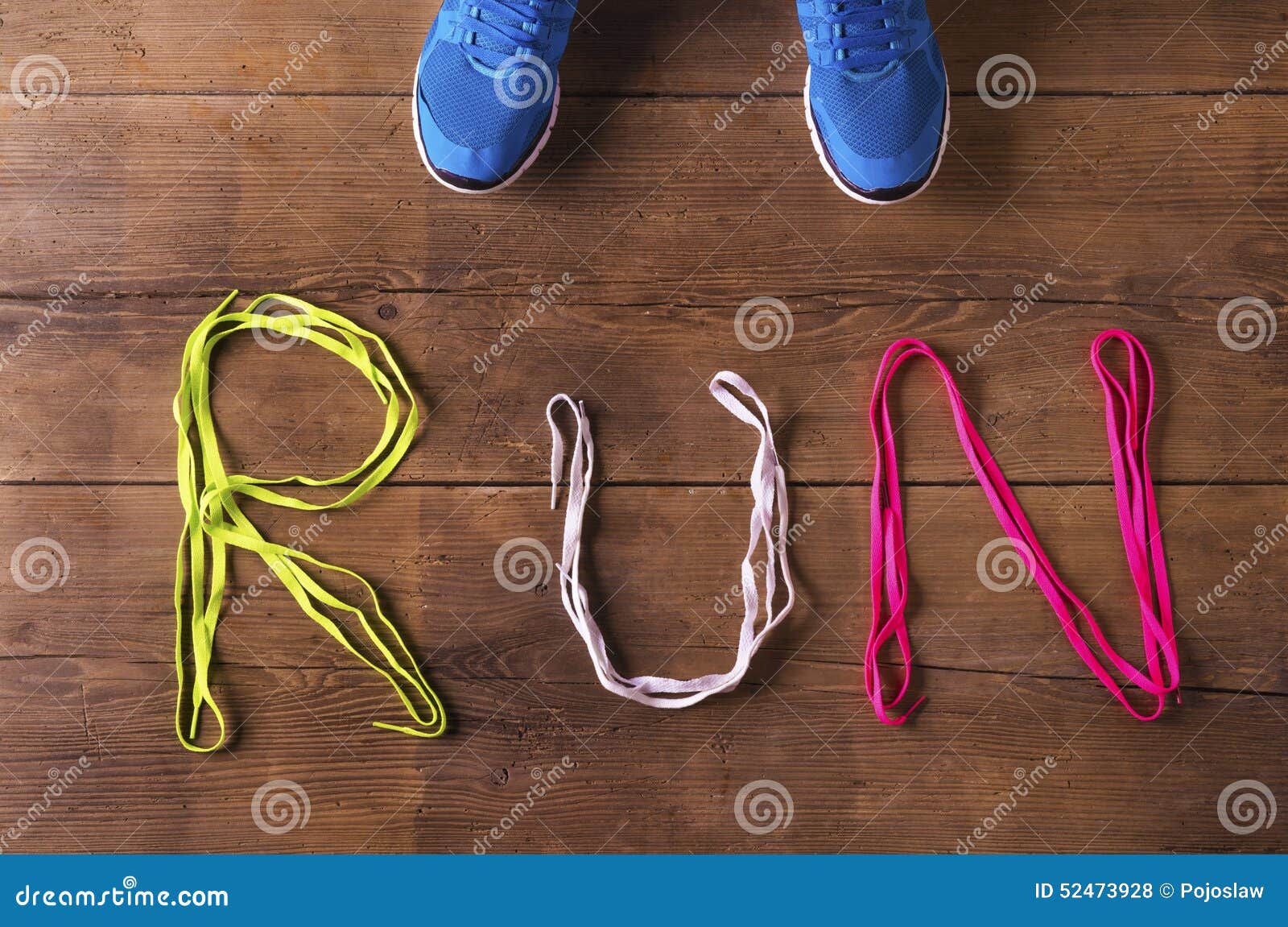 Running shoes on the floor stock photo. Image of trainers - 52473928