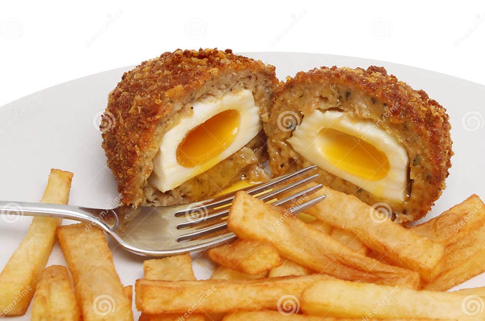 Runny scotch egg and chips stock photo. Image of sausage - 28048604