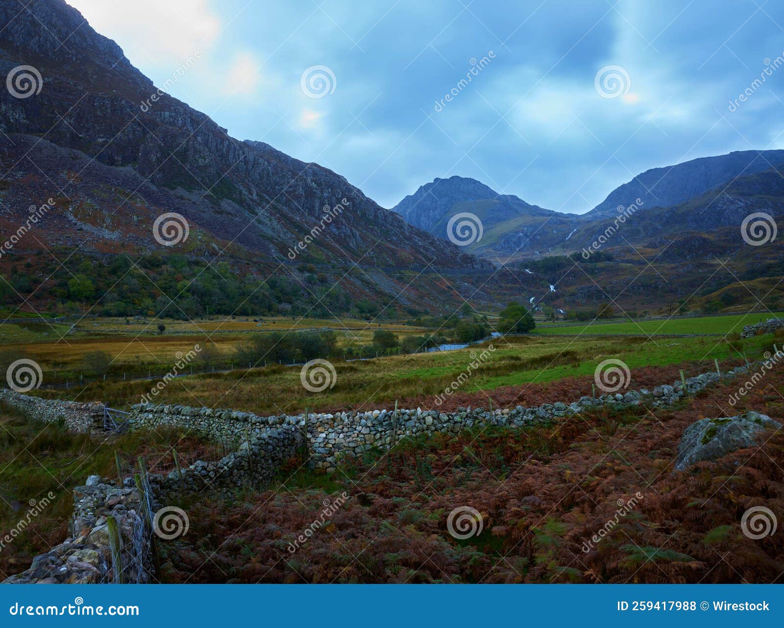 rural area at maes caradoc, surrounded by stone fences and rocky mountains in north wales