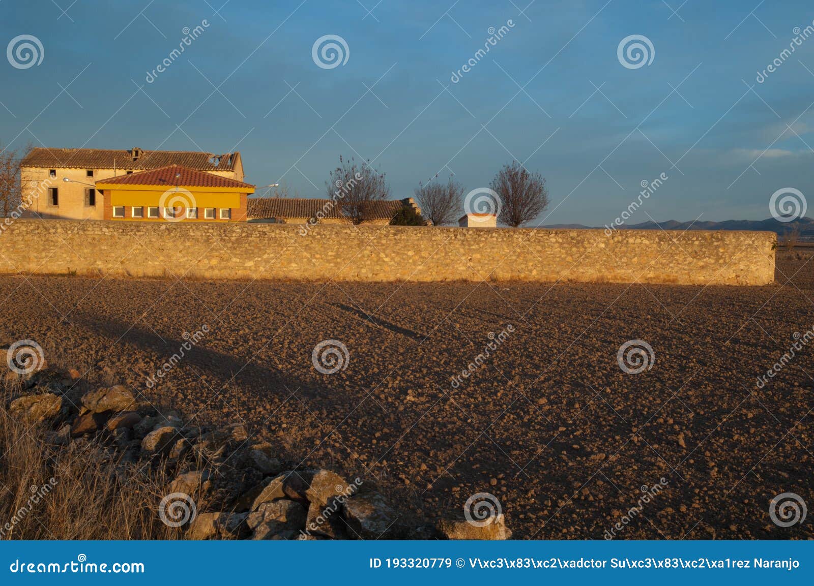 buildings and rural landscape in the village of bello.