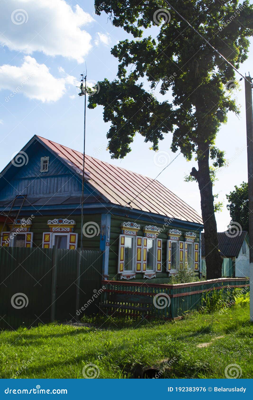 Rural Wooden House With Carved Ornamental Windows In Belarus Stock