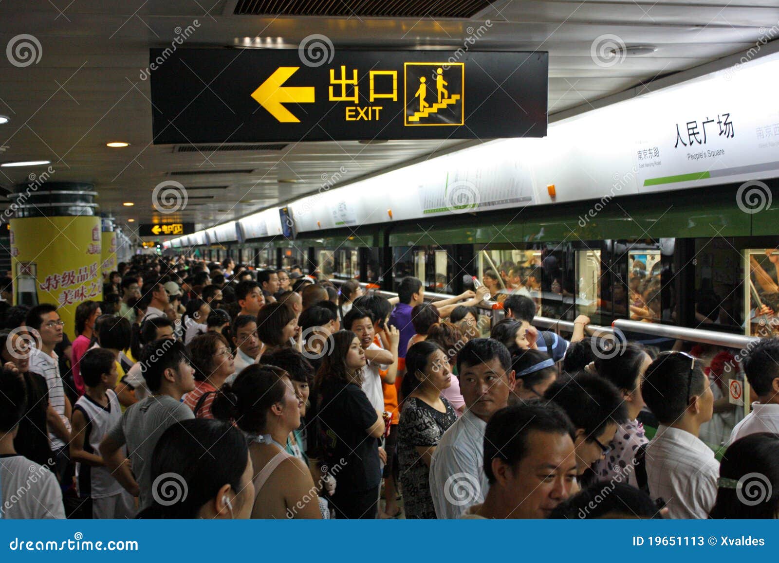 MAN WITH MEGAPHONE PUSH COMMUTERS INTO CROWDED TRAIN SO DOORS WILL CLOSE  RUSH HOUR AT PEOPLE S SQUARE SHANGHAI CHINA Stock Photo - Alamy