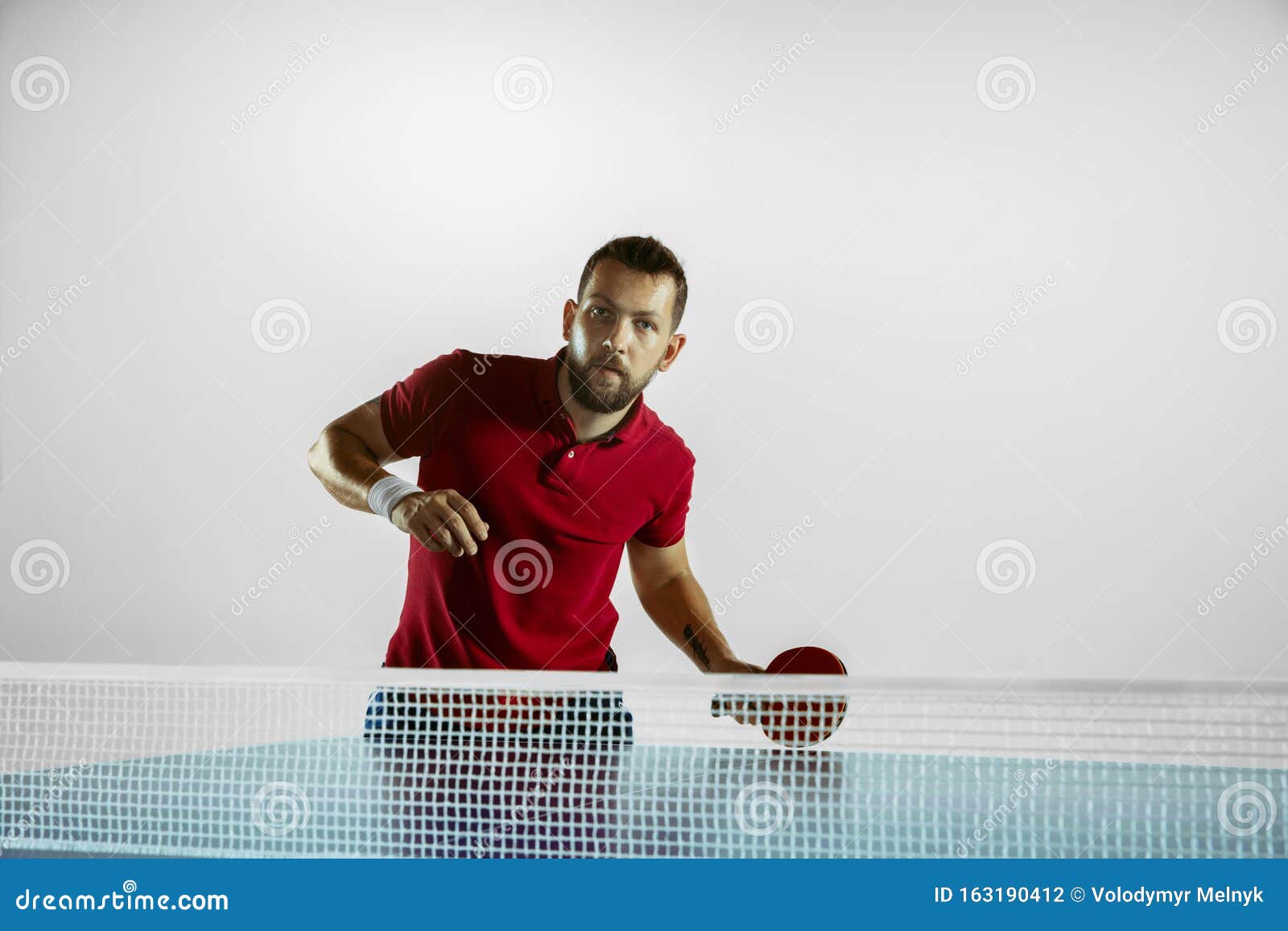 Young Man Playing Table Tennis On White Studio Background Stock Photo Image Of Pingpong Emotions