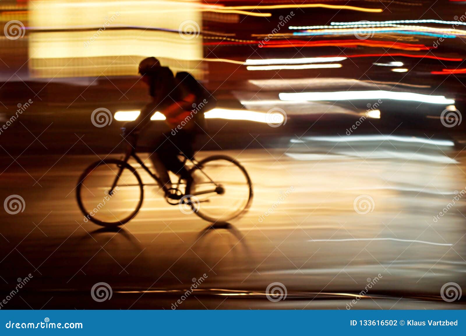 rushhour with cyclists and pedestrians at night