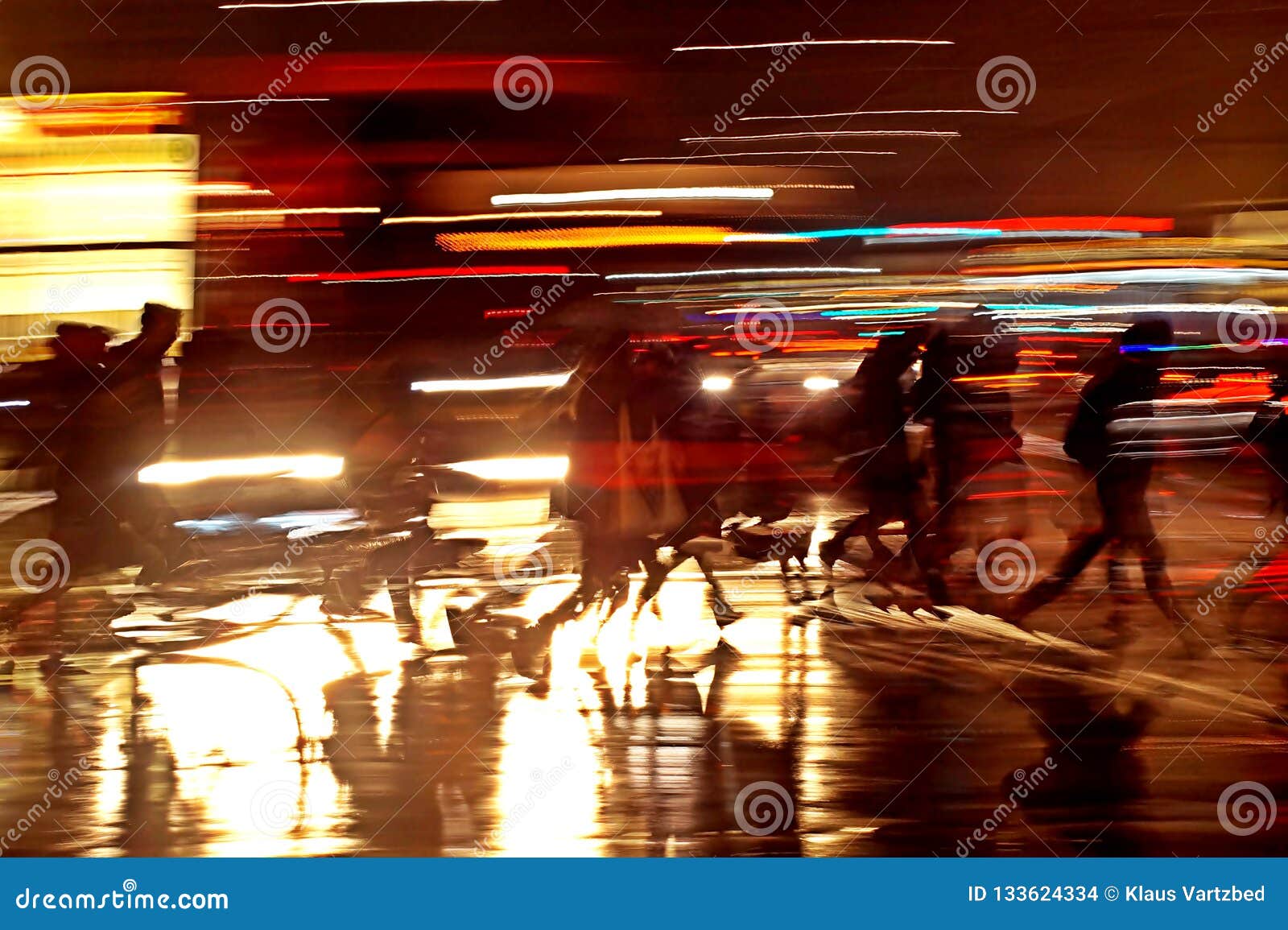 rushhour with cyclists and pedestrians at night