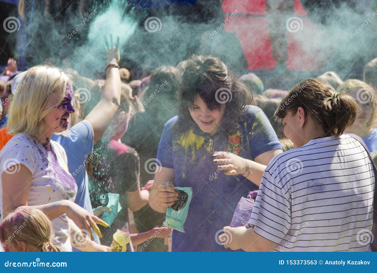 Russia, Krasnoyarsk, June 2019: Young People Play With Colors. The