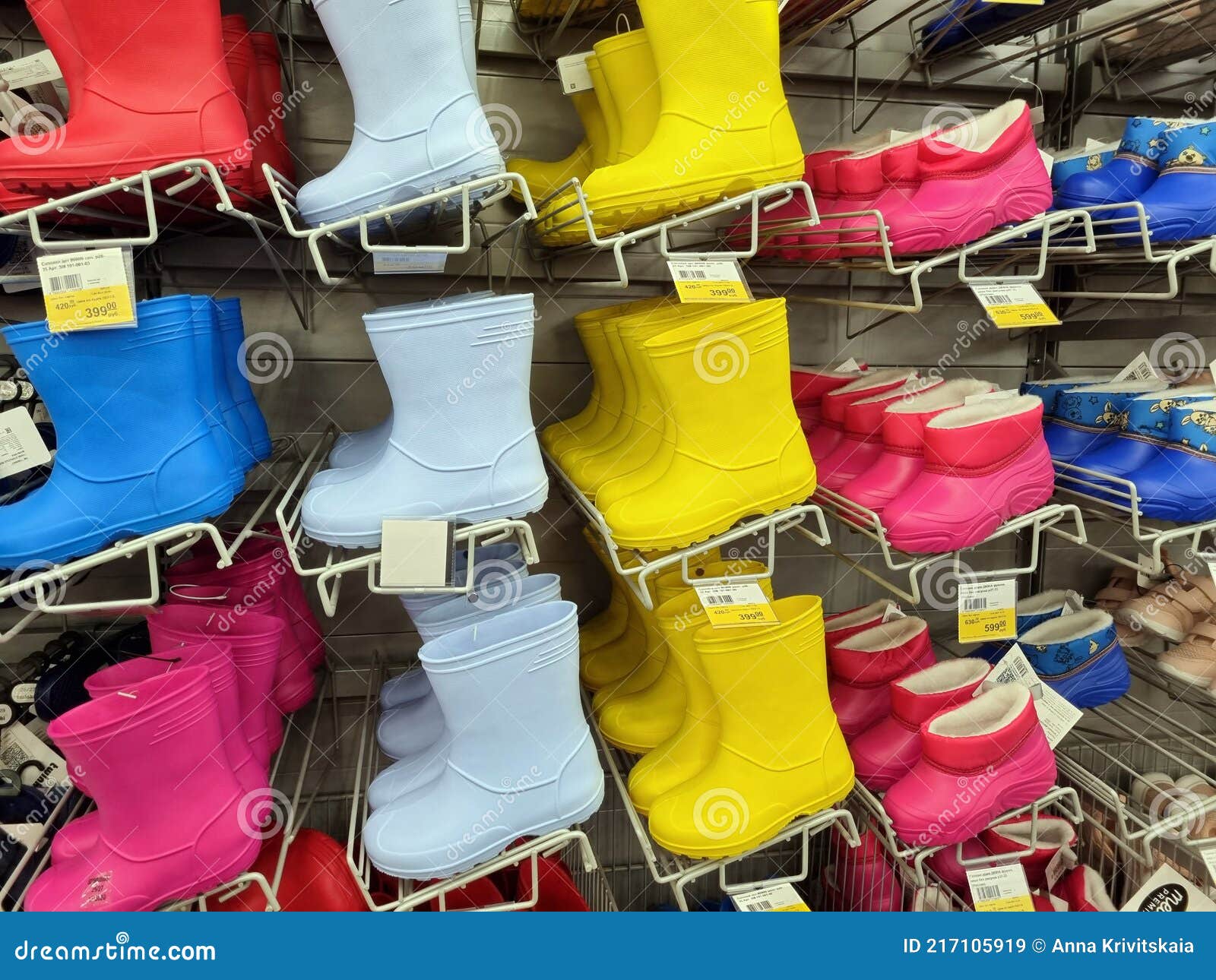 Bright Children`s Rubber Boots on Sale in a Supermarket Editorial Stock ...