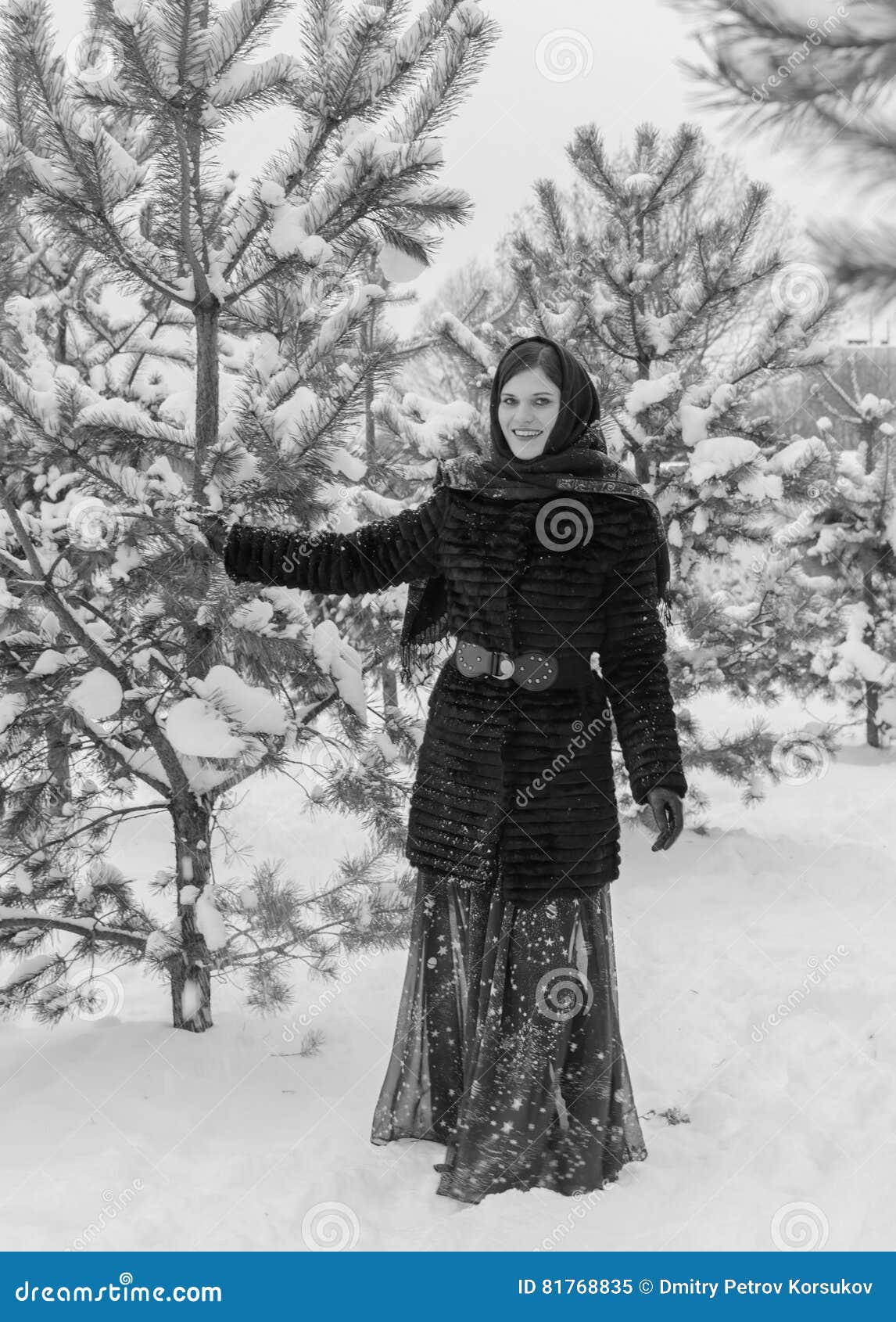 Russian Beautiful Girl Near The Christmas Tree In The Woods Stock Image