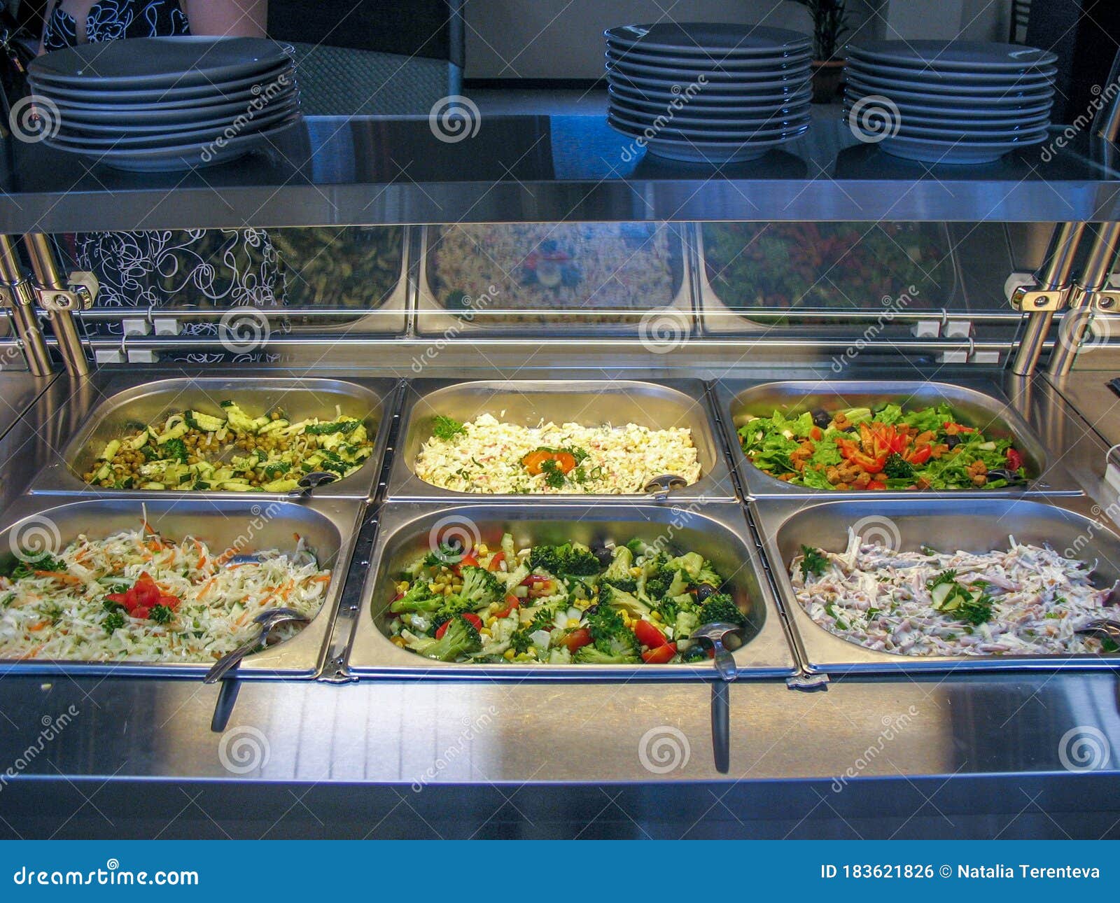 Rows of Trays with Fresh Ready Food in a Russian Cuisine Canteen Stock