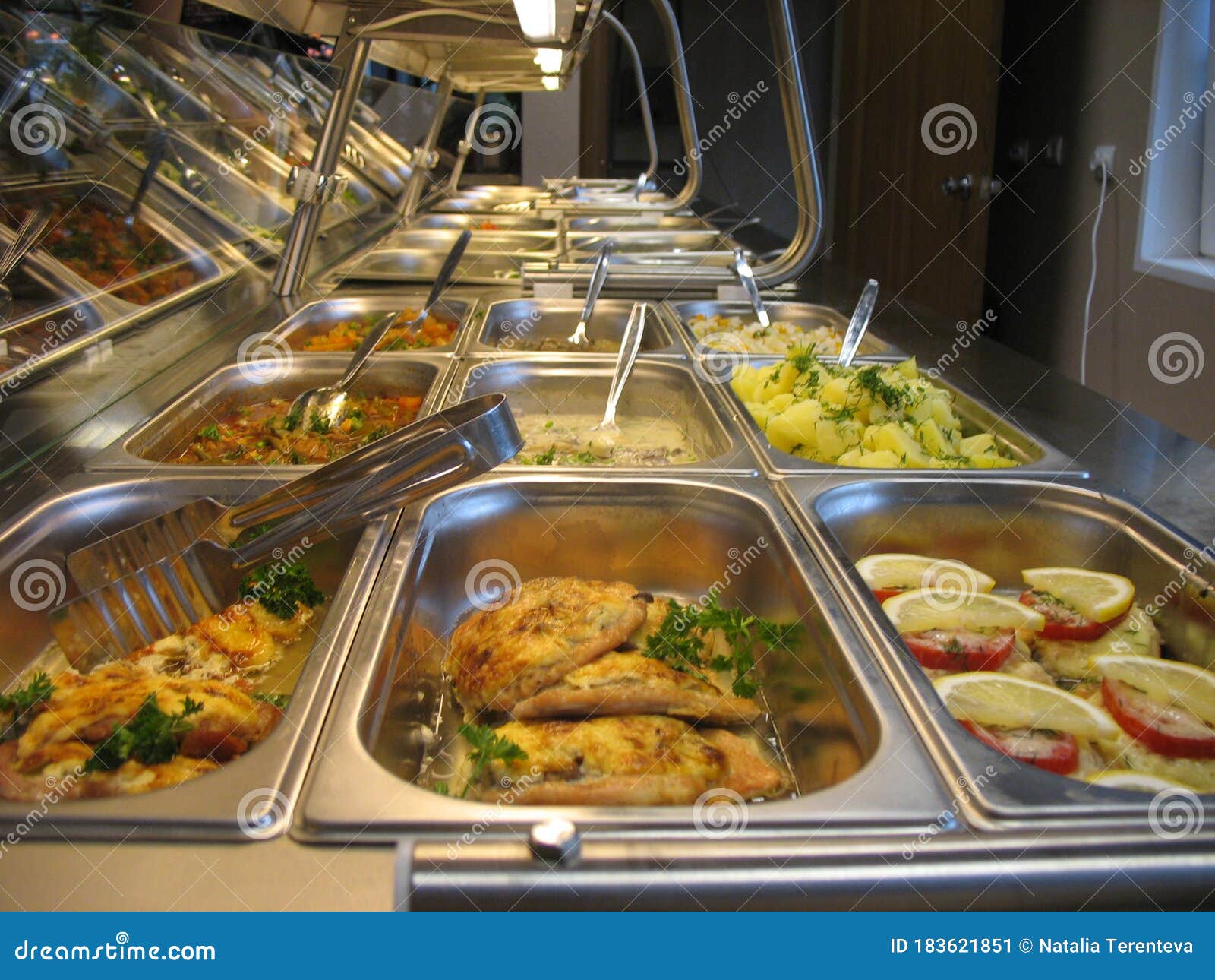 Steel Trays with Fresh Ready Food in a Russian Cuisine Canteen Stock