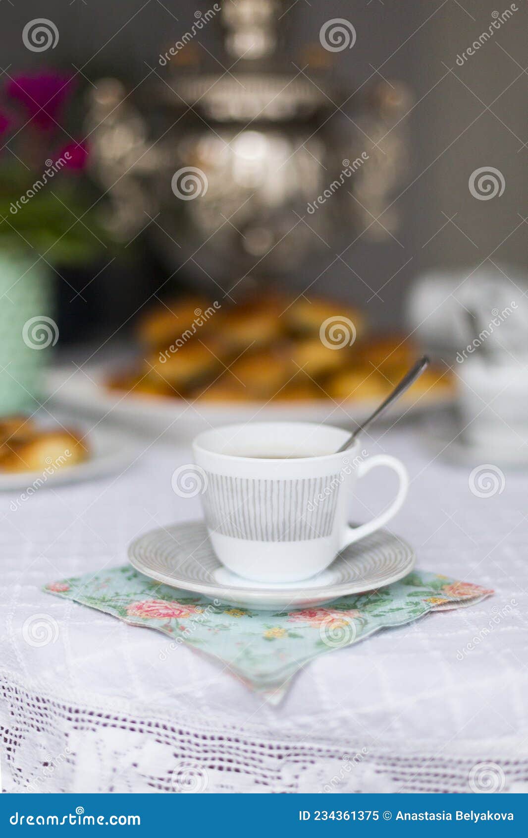 russian traditional teaparty with samovar and pies or pirozhki with apple jam