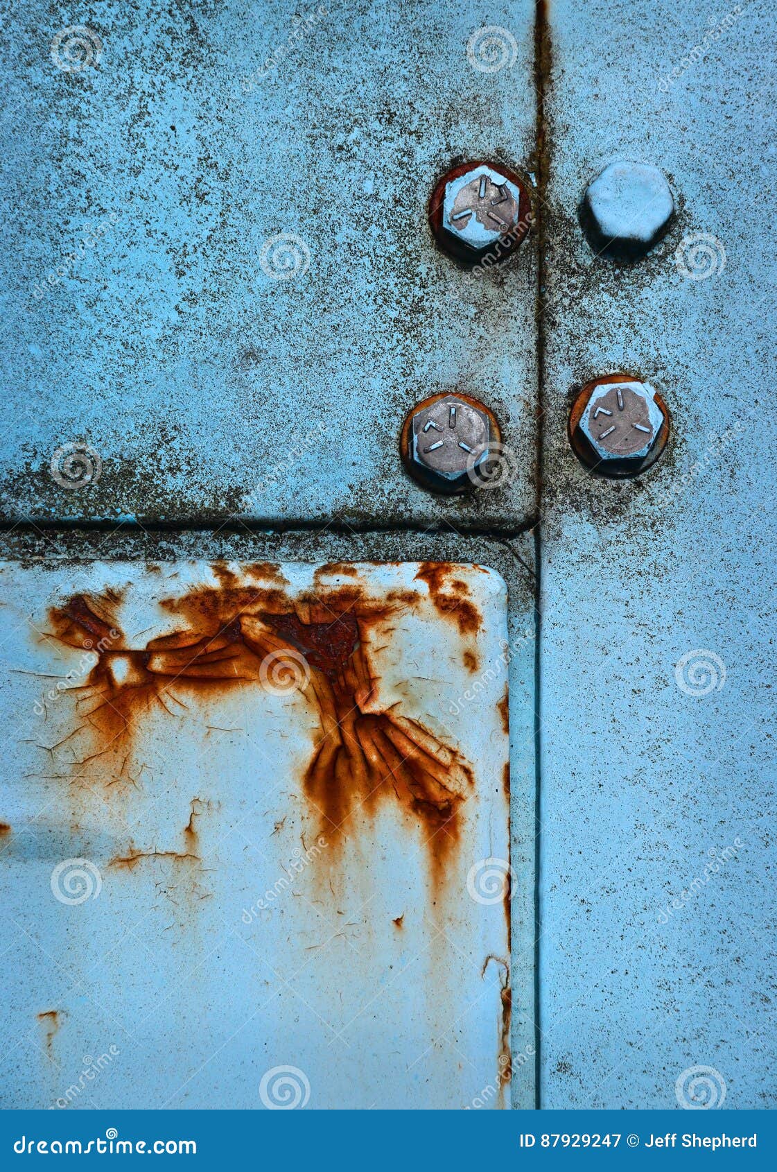 rust on blue metal panels